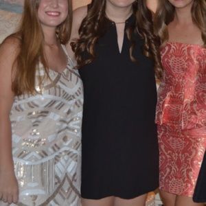 Black sleeveless shift dress